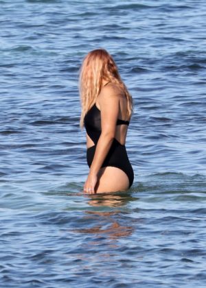 Busy Philipps in Black Swimsuit on the beach in Mexico